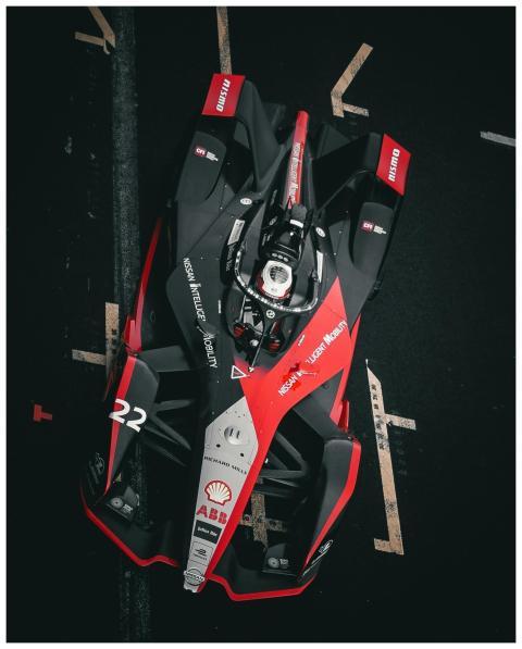 Aerial view of a sleek formula race car on a track