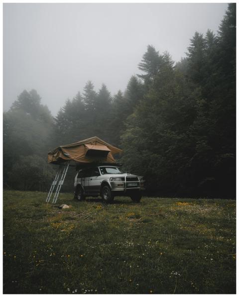 Explore adventure camping with a rooftop tent in a