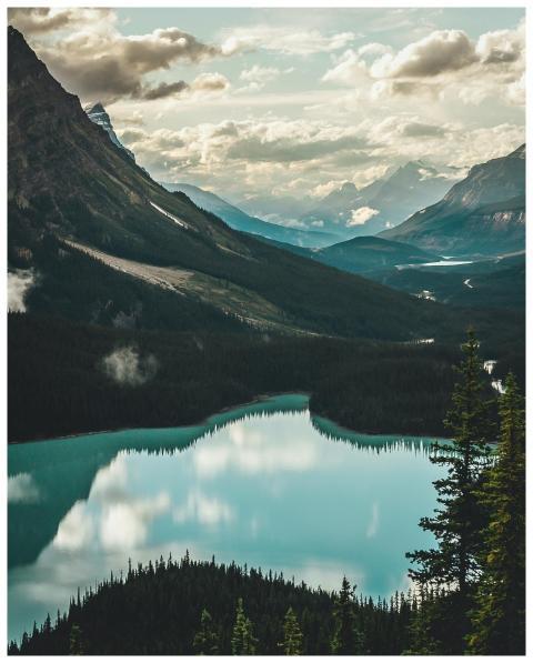 Stunning view of a tranquil lake surrounded by tow