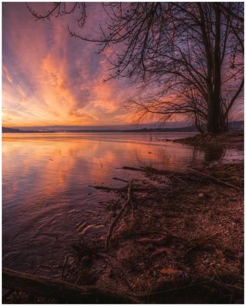 Sunset Over Calm Lake