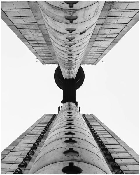 Captivating low angle shot of iconic brutalist arc