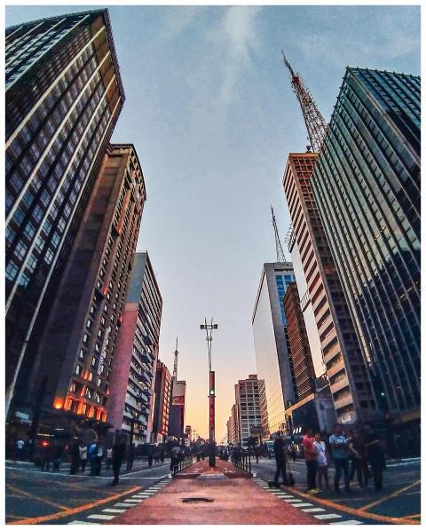 Dynamic street view of a bustling city with toweri