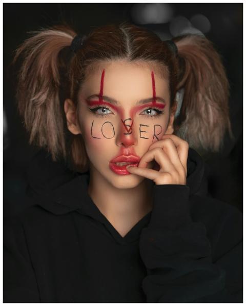 Artistic portrait of a woman with eerie Halloween