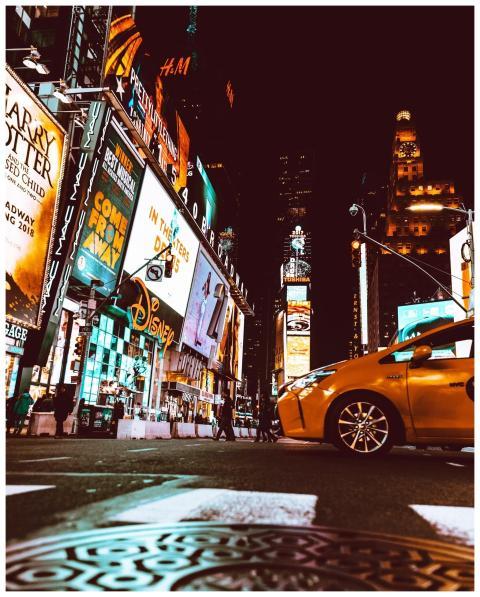 A night view of Times Square, New York, illuminate