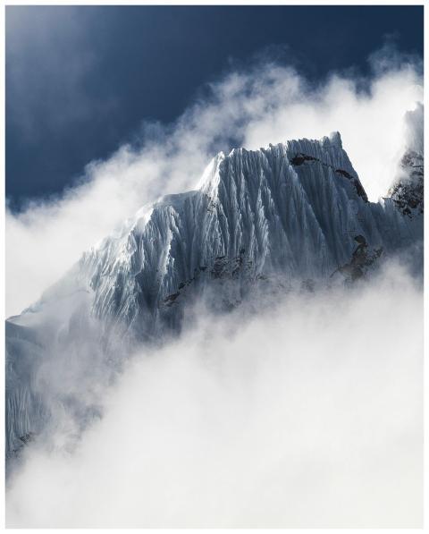 Breathtaking view of a snow-capped mountain peak r