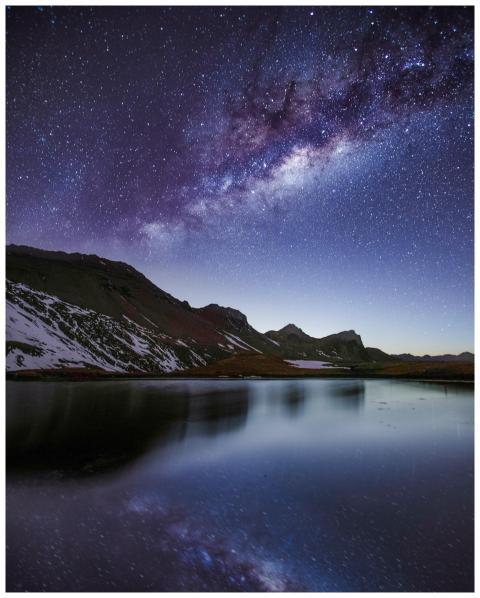 Breathtaking view of the Milky Way galaxy reflecti