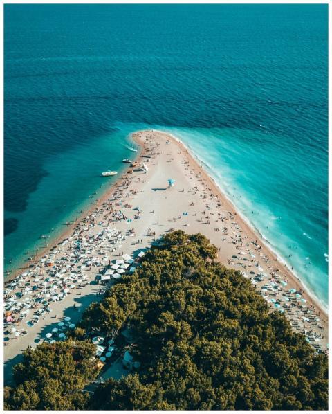Stunning aerial view of Zlatni Rat beach in Bol, C