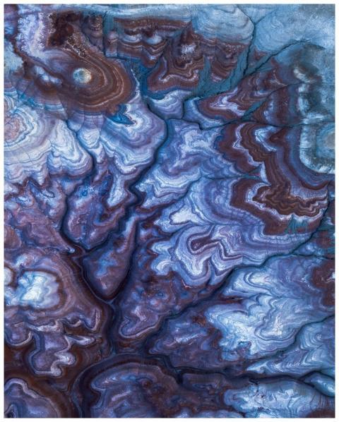 Close-up of swirling abstract patterns in blue and