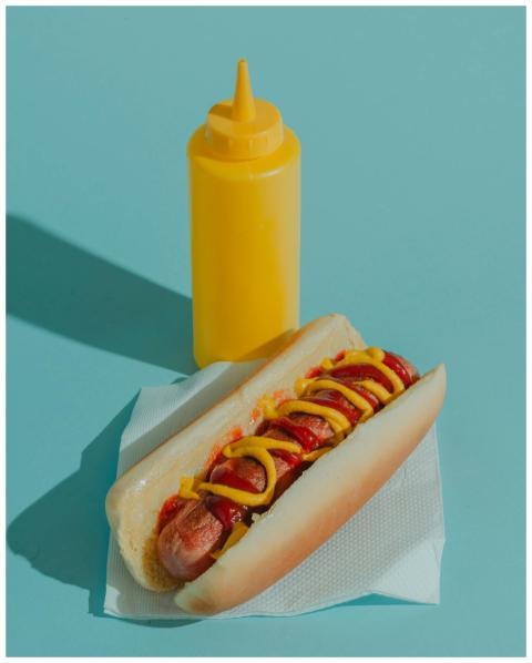 Delicious hot dog topped with ketchup and mustard