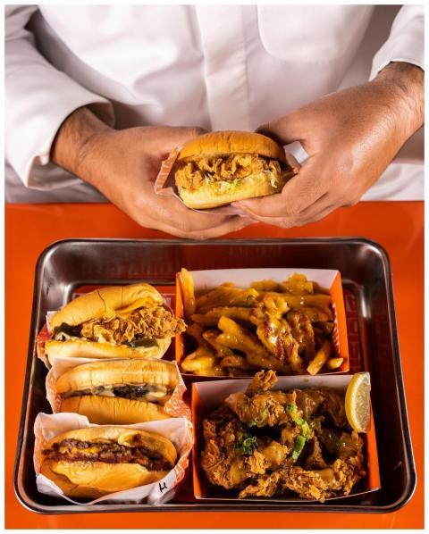 A tempting flat lay of fried food including burger