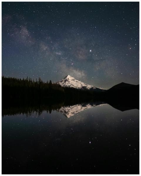 Snow-capped Mount Hood reflected in a serene lake