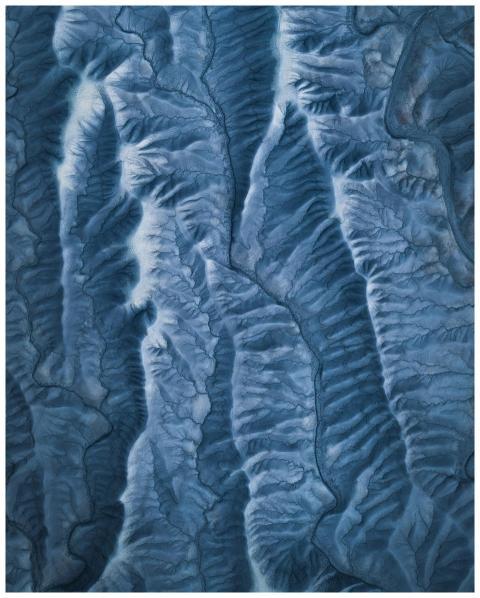 Stunning aerial shot of winter mountains showcasin