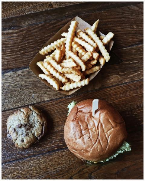 A tempting burger meal with crinkle-cut fries and