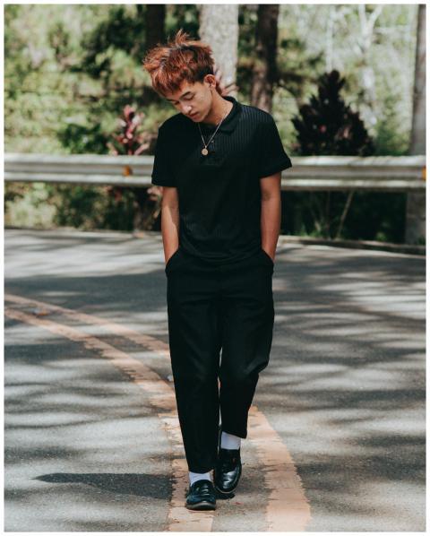 Young Man Walking Sunlit