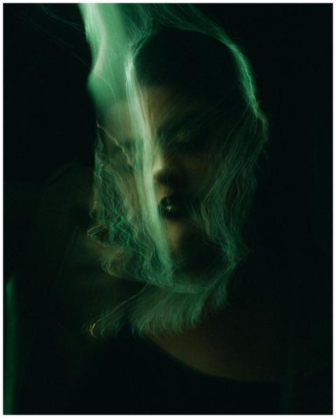 Mysterious portrait with abstract light effects bl