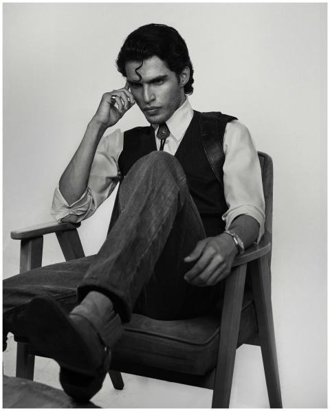 Black and white portrait of a man in deep thought