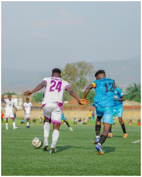 Exciting outdoor soccer match between players in v