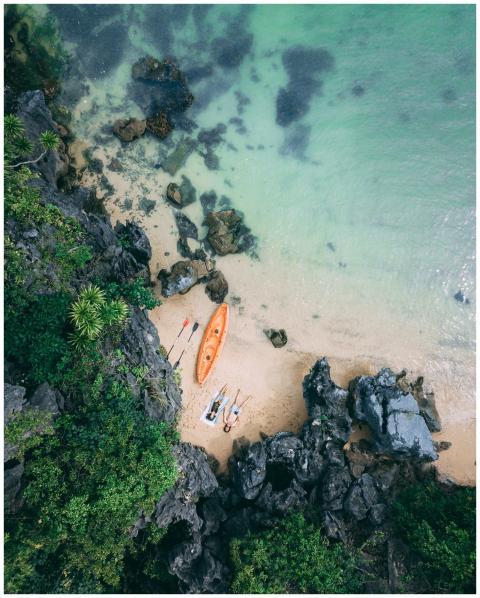 Captivating aerial shot of a serene beach with a k