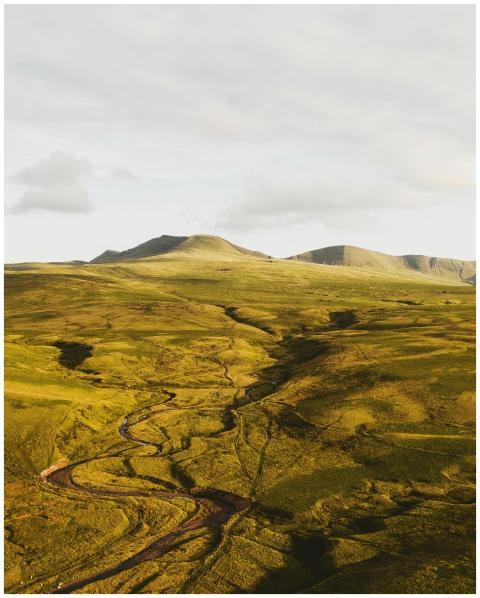 Explore the serene beauty of rolling hills and vas