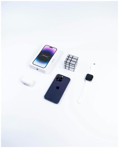 Modern Apple gadgets arranged on a white backgroun