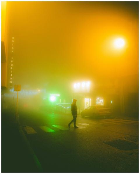Side view of anonymous person crossing road on cro