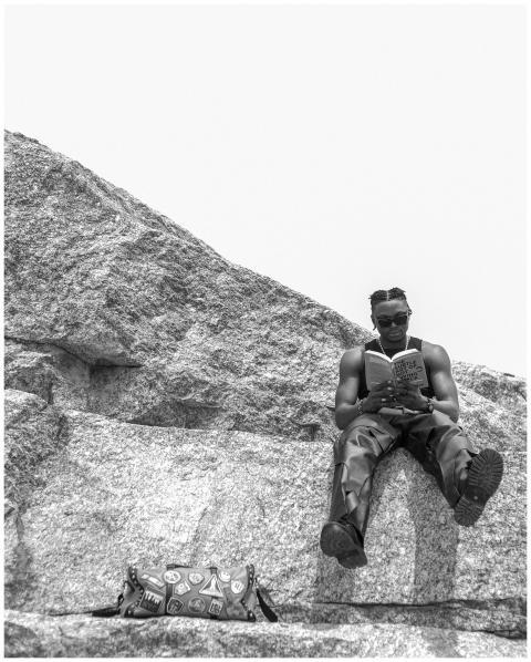 Man Reading Book Rocky