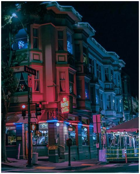 A lively urban nightscape on Beach Street, San Fra
