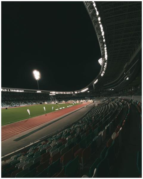 Stunning nighttime view of a well-lit stadium in M