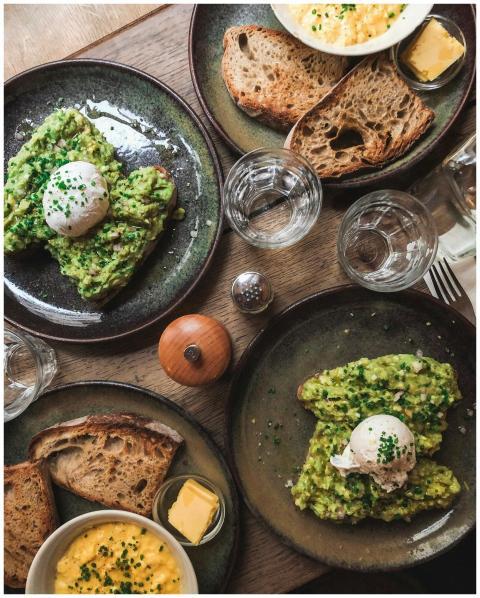 A delicious brunch featuring avocado toast and poa