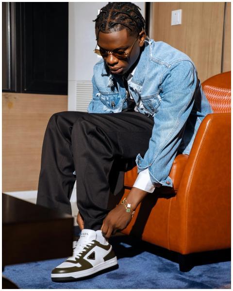 Stylish Young Man Adjusting