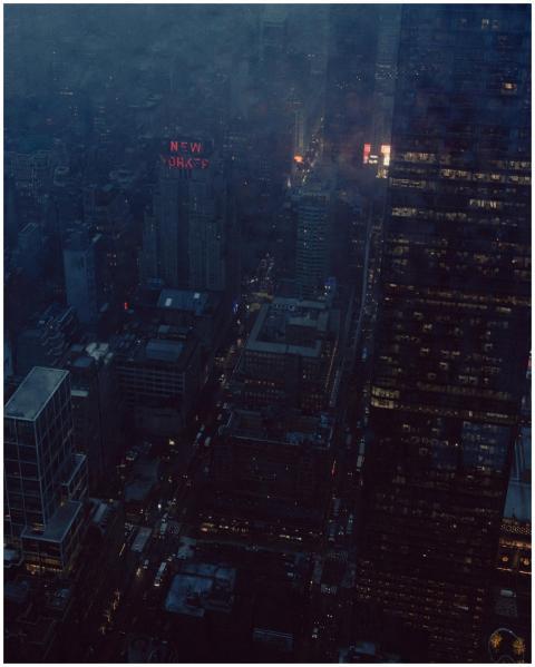 A dramatic aerial view of New York City at night w
