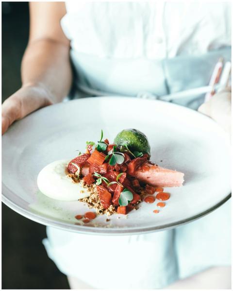 Delicious gourmet dessert with fresh fruit and sau