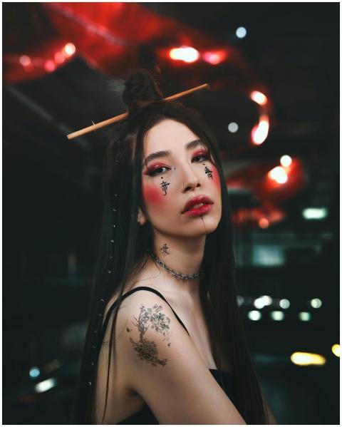 Captivating portrait of a tattooed woman with dram