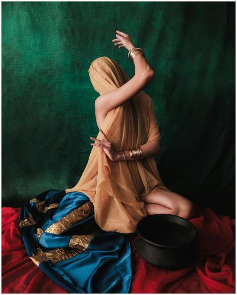 An artistic portrait of a woman in traditional eth