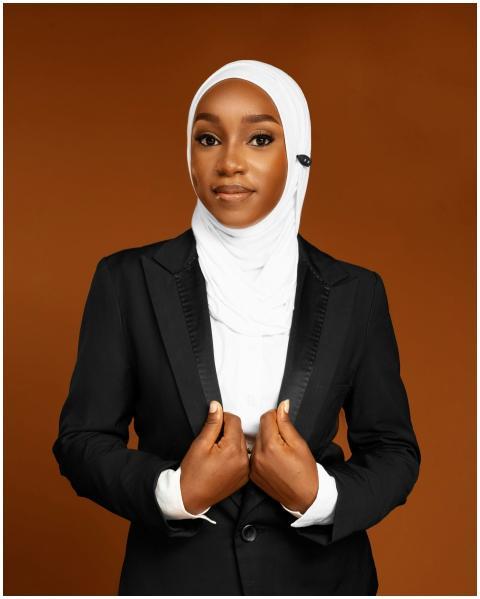 Confident African woman wearing a hijab and suit a