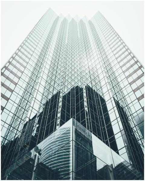 Striking low angle view of a modern skyscraper wit