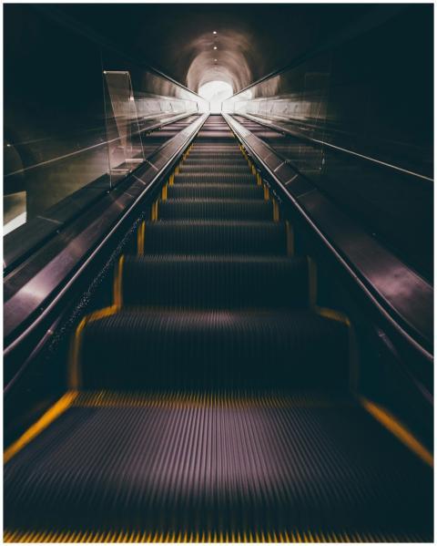 A captivating view of a modern escalator leading u