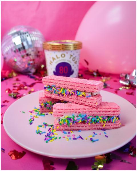 Bright pink ice cream sandwiches with colorful spr