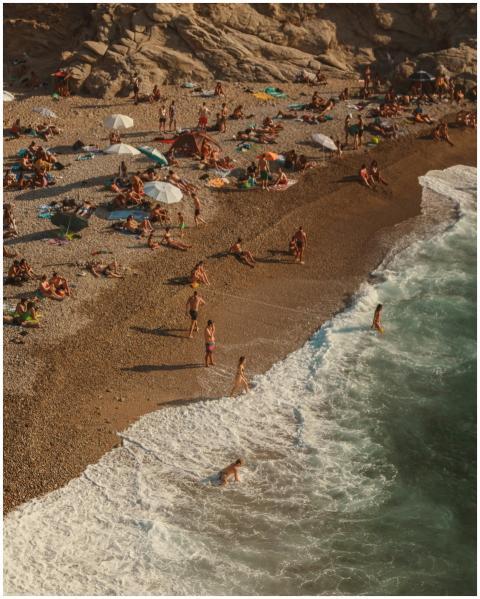 A lively aerial scene of people enjoying a summer