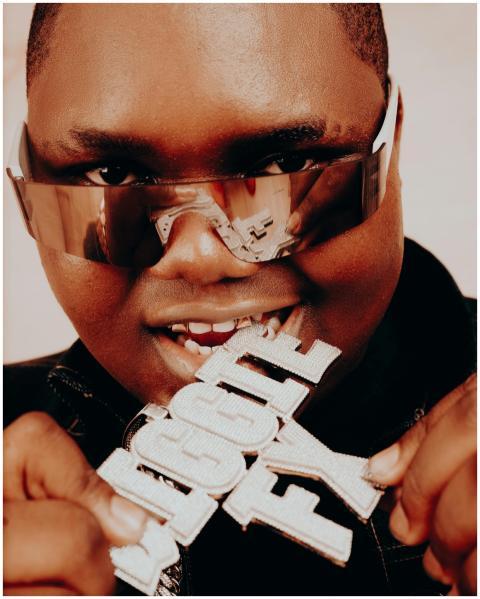 Vibrant close-up of a stylish man wearing sunglass