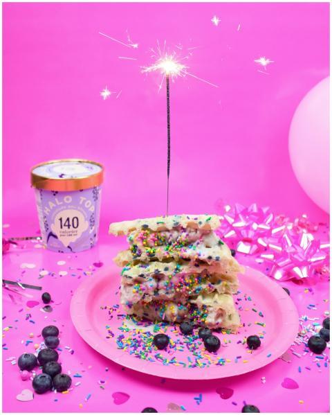 Colorful birthday treat with waffles, sprinkles, a