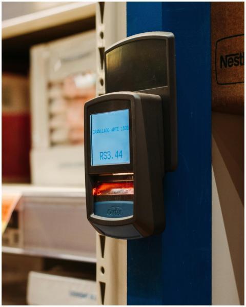 Close-up of a barcode scanner displaying price in
