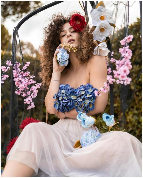 Stunning portrait of a woman surrounded by vibrant