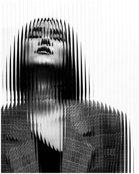 Black and white portrait of a woman with a distort