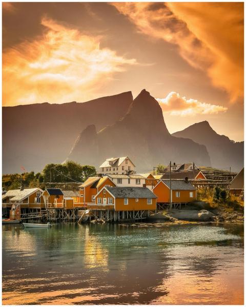 Scenic view of a colorful village by the fjord aga