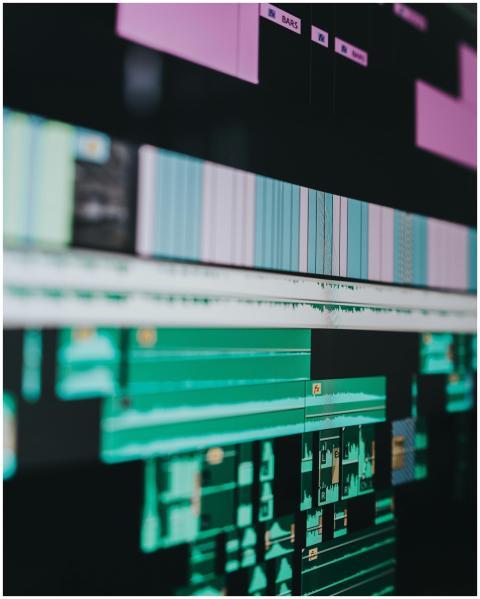Blurred close-up of video editing timeline on a co