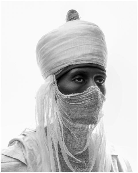 A captivating black and white portrait of a person