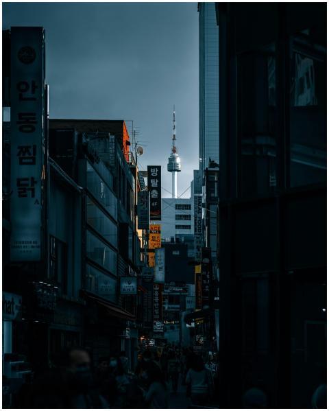 Moody street view of N Seoul Tower through the dow
