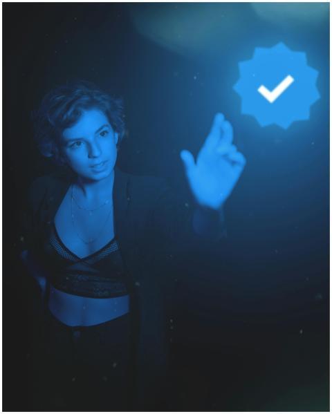 A woman engages with a digital interface, illumina