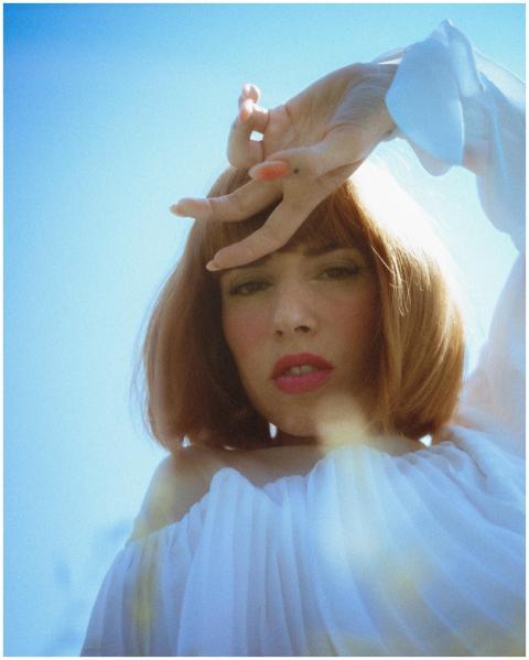 Artistic portrait of a woman with bob haircut shie